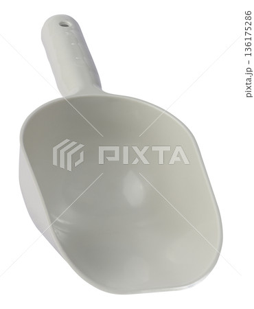 A universal plastic scoop for bulk products or feed in gray on an isolated background. A universal plastic scoop for bulk products or feed in gray on an isolated background. 136175286