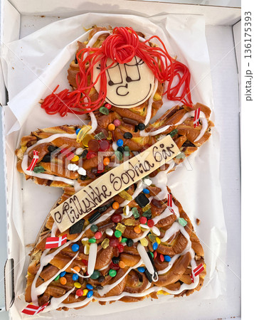 Danish birthday pastry in decorative human shape 136175393
