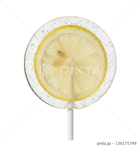 Refreshing, translucent lollipop with a real lemon slice inside, isolated on a stick. Sweet-and-sour summer treat or unique candy concept 136175799