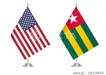 Flags of United States and Togo. The concept of partnership and joint action. Symbol of partnership, cooperation, international collaboration, peaceful negotiations, alliance, bilateral communication Flags of United States and Togo. The concept of partnership and joint action. Symbol of partnership, cooperation, international collaboration, peaceful negotiations, alliance, bilateral communication 136176658