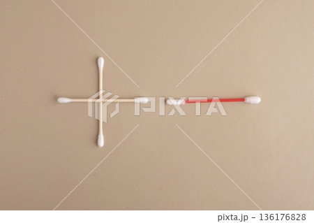 Comparison of reusable and disposable cotton swabs on neutral background Comparison of reusable and disposable cotton swabs on neutral background 136176828