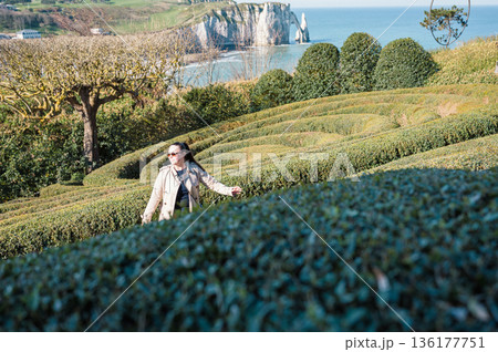 Woman in Jardins d'Etretat 136177751
