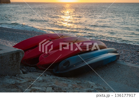 Boats and Beach of Etretat at Sunset Boats and Beach of Etretat at Sunset 136177917