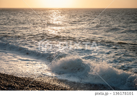 Ocean Wave near Etretat Cliffs 136178101
