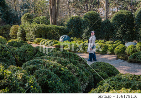 Woman in Jardins d'Etretat 136178116