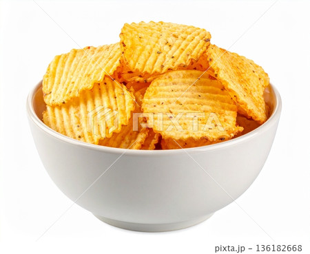 A bowl of crispy potato chips on a white background A bowl of crispy potato chips on a white background 136182668