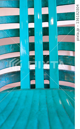Close-up Detail of Cyan Plastic Chair Backrest Texture Close-up Detail of Cyan Plastic Chair Backrest Texture 136182804