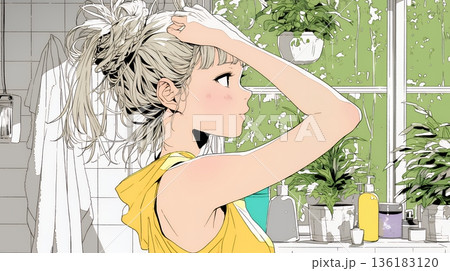 朝支度：洗面所で髪をまとめている若い女性