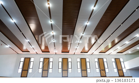Wide Angle View of Hall Interior with Large Windows and Decorative Ceiling Wide Angle View of Hall Interior with Large Windows and Decorative Ceiling 136183171