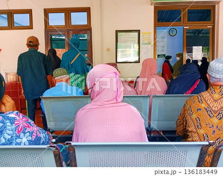Portrait of many patients waiting for calls for medical examinations at a hospital in Yogyakarta, Indonesia on 05-27-2024 Portrait of many patients waiting for calls for medical examinations at a hospital in Yogyakarta, Indonesia on 05-27-2024 136183449