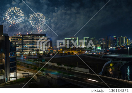 High Angle View of Al Raha Beach Waterfront with Fireworks from Yas Island Abu Dhabi 136184871
