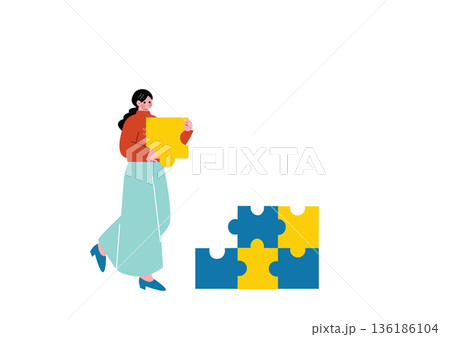 パズルを組み立てる女性 136186104