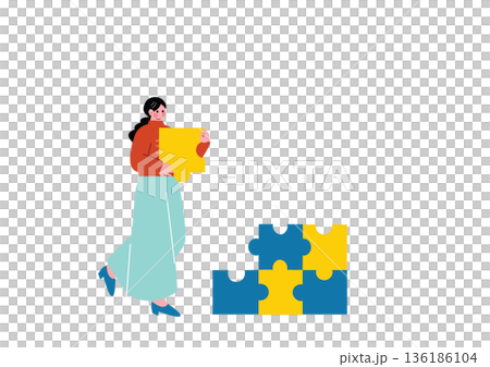 パズルを組み立てる女性 136186104