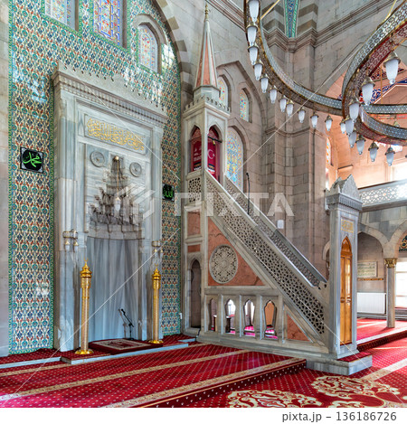Ornate interior of Burunguz Mosque with mihrab, minbar, colorful tiles, and stained glass in Kayseri, Turkey Ornate interior of Burunguz Mosque with mihrab, minbar, colorful tiles, and stained glass in Kayseri, Turkey 136186726