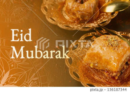 Celebration of Eid Mubarak with traditional sweets during the month of Ramadan 136187344