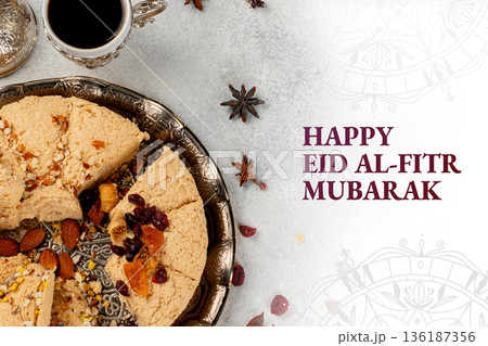 Celebration of Eid al-Fitr with sweets and coffee during Ramadan in a home setting Celebration of Eid al-Fitr with sweets and coffee during Ramadan in a home setting 136187356