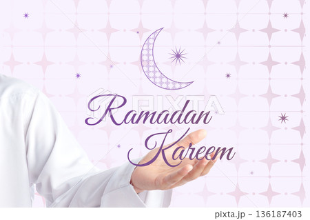 Celebration of Ramadan with a hand showing greetings and a crescent moon design Celebration of Ramadan with a hand showing greetings and a crescent moon design 136187403