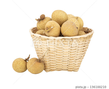 longan fruit in basket isolated on white background 136188210