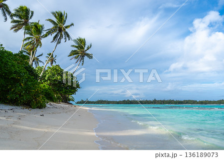 Anini Marae Beach on Huahine, French Polynesia, with turquoise waters 136189073