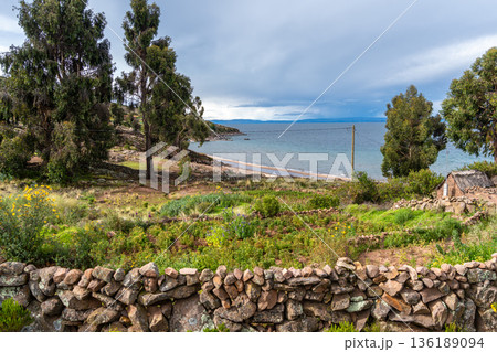 Sandy beach on Taquile Island, Lake Titicaca, Peru 136189094