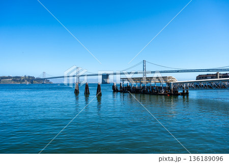 Scenic waterfront view with Oakland Bay Bridge in San Francisco 136189096