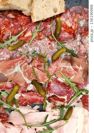 Italian appetizers table with different antipasti Italian appetizers table with different antipasti 136190066