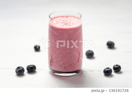 One glass of berry smoothie with chia and fresh berries One glass of berry smoothie with chia and fresh berries 136191726