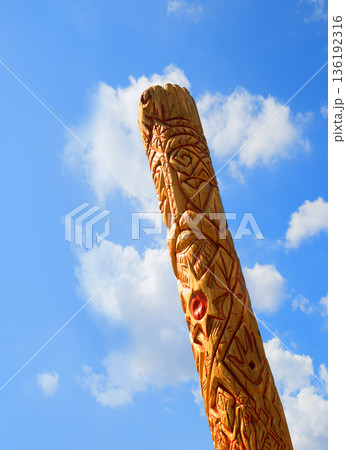Old wooden idol in the field Old wooden idol in the field 136192316