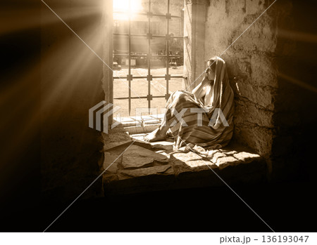 Lone girl sitting in the castle 136193047