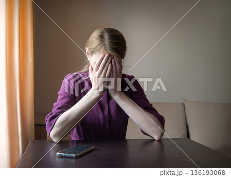 Sad girl praying to God 136193068
