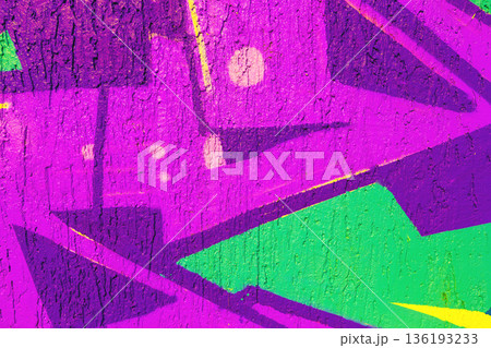 Abstract Purple and Green Graffiti Art with Yellow Accents Inspired by 80s Neon Street Style 136193233