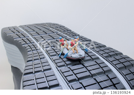 Miniature Rafters Navigating Rapid Course On Giant Shoe Miniature Rafters Navigating Rapid Course On Giant Shoe 136193924