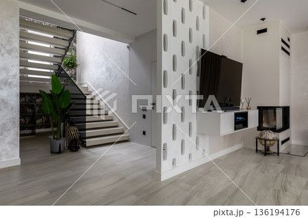 Modern Open Plan Interior with Staircase and TV Area Modern Open Plan Interior with Staircase and TV Area 136194176
