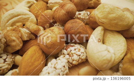Mixed nuts and seeds creating a healthy snack 136196005