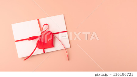 Love letter envelope with red heart ribbon Love letter envelope with red heart ribbon 136196723