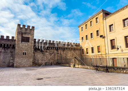 View of the ancient medieval walls of Vitoria-Gasteiz, featuring stone battlements and a central 136197314