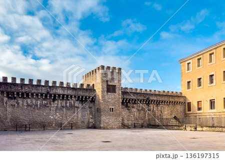 View of the ancient medieval walls of Vitoria-Gasteiz, featuring stone battlements and a central 136197315