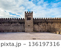 View of the ancient medieval walls of Vitoria-Gasteiz, featuring stone battlements and a central 136197316