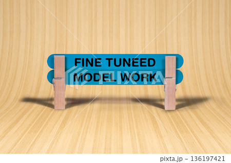 Concept words Fine Tuneed , Model Work , Double Blue Wooden Stick Clothespin with curved wood parquet hardwood Background , Artificial intelligence and Fine Tuneed , Model Work Theme Concept words Fine Tuneed , Model Work , Double Blue Wooden Stick Clothespin with curved wood parquet hardwood Background , Artificial intelligence and Fine Tuneed , Model Work Theme 136197421