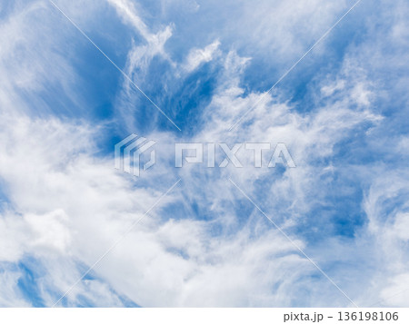 Blue sky background with tiny clouds.  136198106