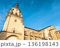 Low-angle view of Santa Maria Cathedral in Vitoria-Gasteiz, showing its stone bell tower, Gothic 136198143