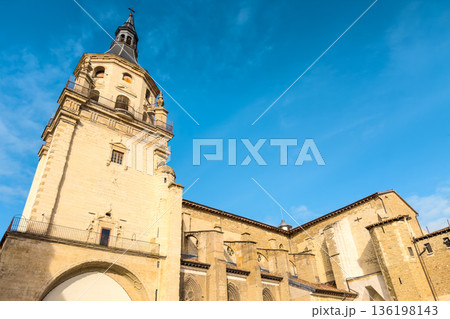 Low-angle view of Santa Maria Cathedral in Vitoria-Gasteiz, showing its stone bell tower, Gothic Low-angle view of Santa Maria Cathedral in Vitoria-Gasteiz, showing its stone bell tower, Gothic 136198143