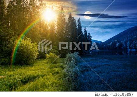 lake in summer mountain landscape. day and night time change concept. fresh body of water surrounded by coniferous forest with sun and moon at twilight. spectacular scenery for astrology wallpaper 136199887