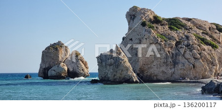 Towering Cyprus Sea Rocks with Vegetation and Blue Horizon Towering Cyprus Sea Rocks with Vegetation and Blue Horizon 136200117