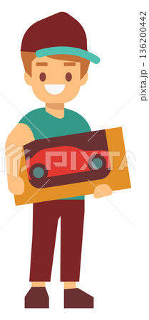 A young man is holding a toy car in his hand A young man is holding a toy car in his hand 136200442