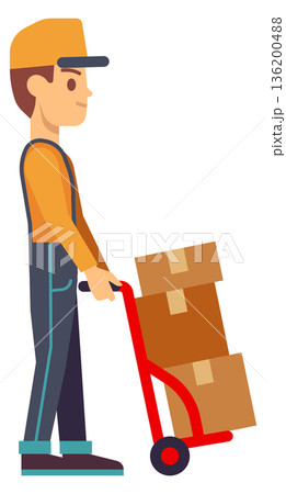 A man in a yellow shirt is pushing a cart with boxes on it A man in a yellow shirt is pushing a cart with boxes on it 136200488