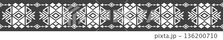 A black and white patterned design with white squares and triangles A black and white patterned design with white squares and triangles 136200710