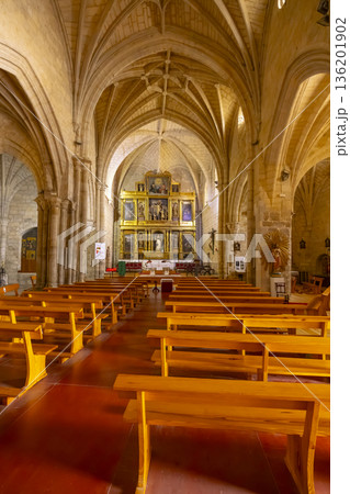 Church interior with altar and wooden pews in Fromista Church interior with altar and wooden pews in Fromista 136201902