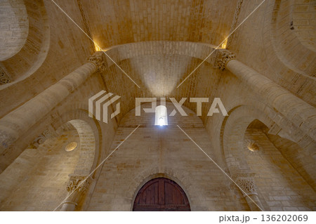 Romanesque church interior with arched ceiling and stone columns Romanesque church interior with arched ceiling and stone columns 136202069