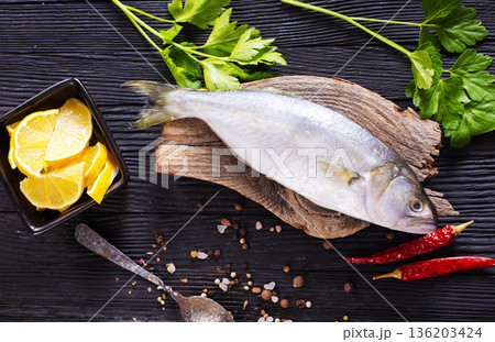 Gray Mullet Fish (Kefal) with spice on board 136203424